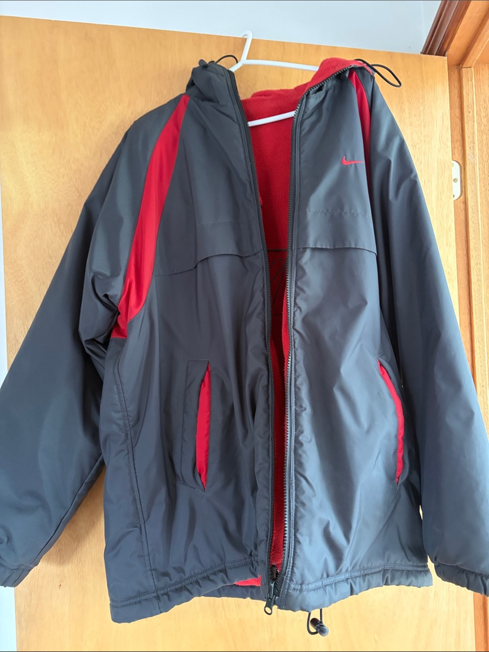 Nike Men’s Black Windbreaker with Red Accents